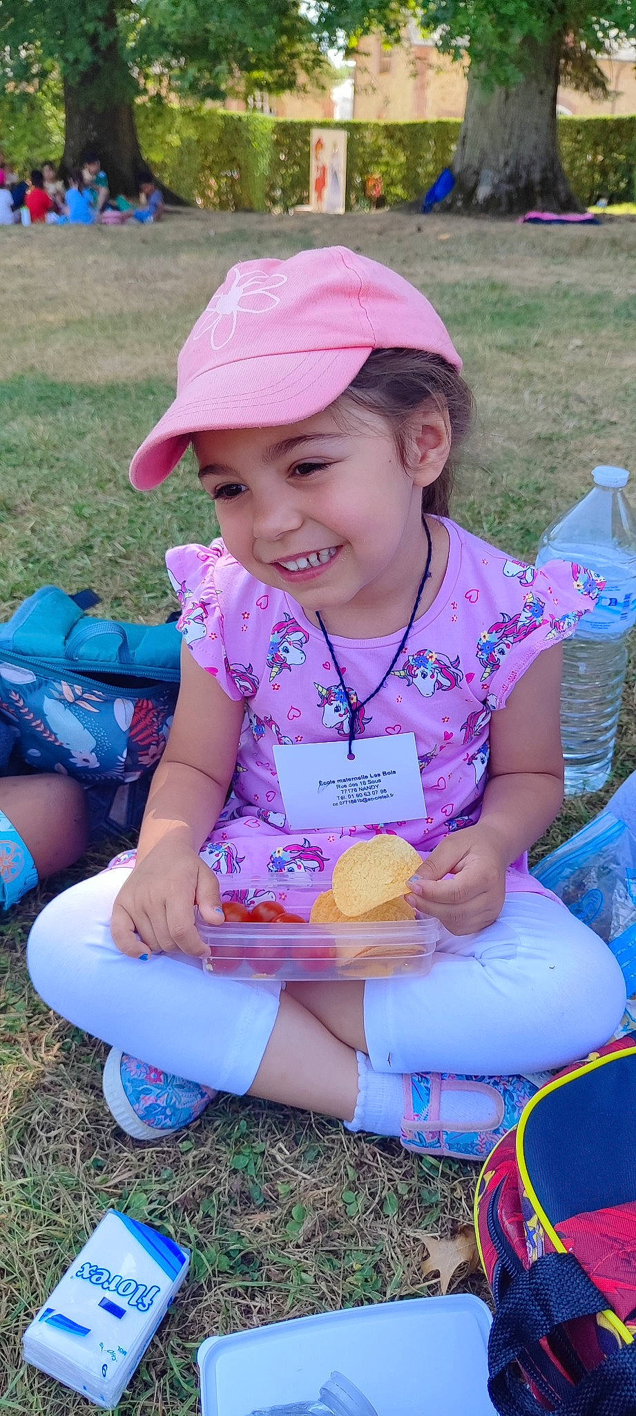 Lorena participe au concours pour gagner de l'argent avec cette photo : baseball_cap, beauty, blue, cap, child, clothing, facial_expression, fun, grass, happy, headwear, joy, leisure, person, pink, product, purple, recreation, shorts, smile