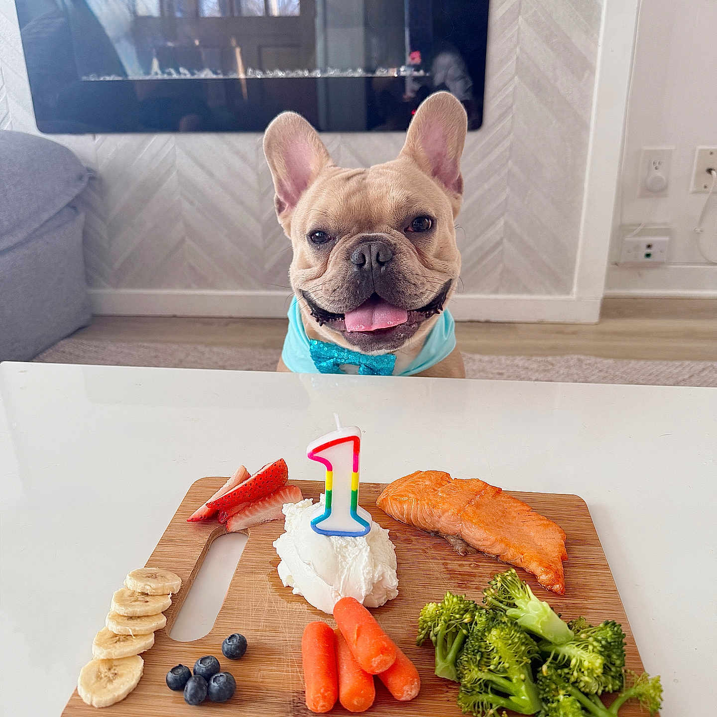 Odinson is registered to the contest to win money with this photo: animal, birthdaycake, bulldog, cake, canine, choppingboard, cream, dessert, dog, food, foodpresentation, frenchbulldog, indoors, interiordesign, lunch, meal, meat, person, pet, pork