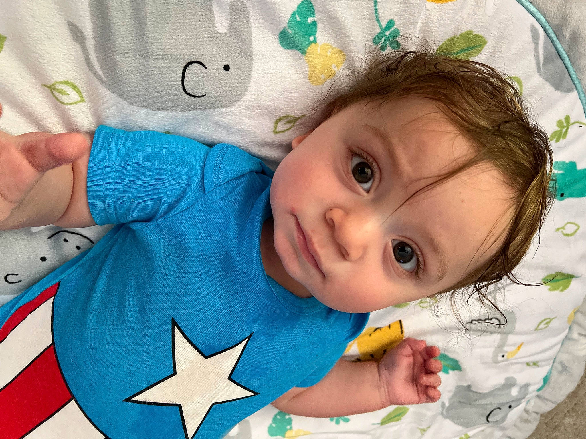 Isaiah is registered to the contest to win money with this photo: azure, baby, baby_toddler_clothing, cheek, chin, eye, eyebrow, face, facial_expression, finger, green, happy, head, iris, nose, person, product, skin, sleeve, textile