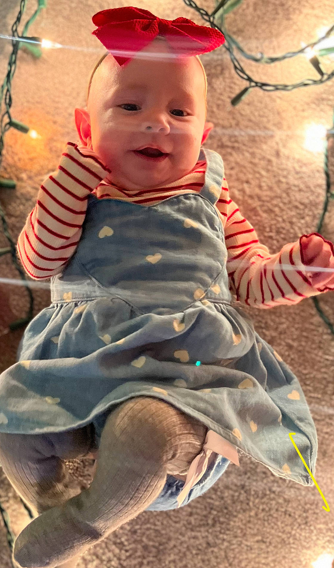 baby, clothing, coat, costume, face, footwear, furniture, happy, hat, head, jeans, lighting, pants, person, photography, portrait, shoe, sitting, t_shirt, toy