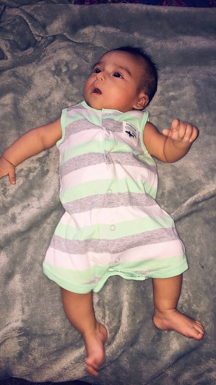 Deangelo joined the competition — help win amazing prizes! abdomen, arm, baby, baby_toddler_clothing, barefoot, cheek, child, eye, fun, leg, nose, person, pink, play, sitting, skin, smile, toddler