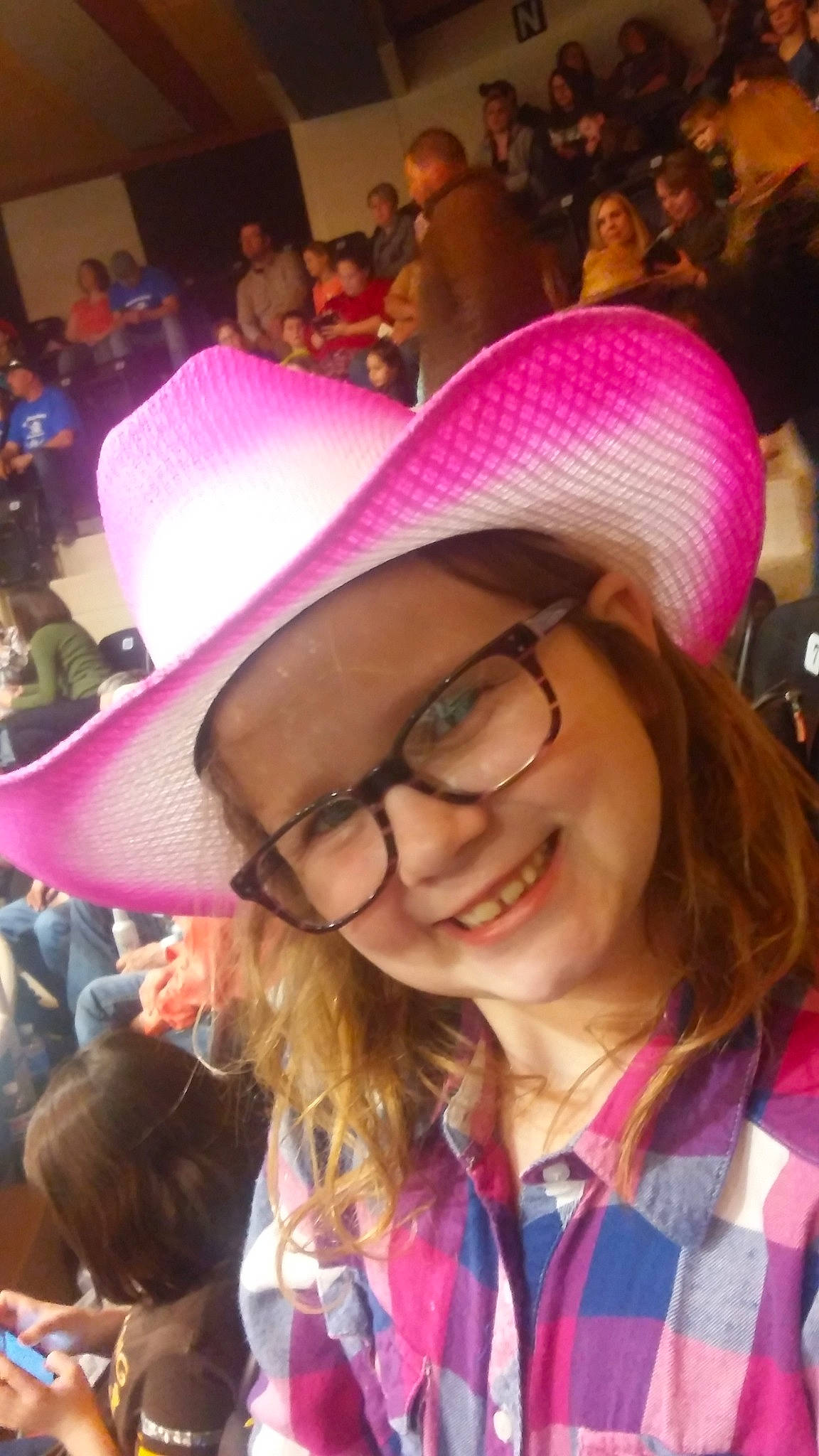 Aubrey is registered to the contest to win money with this photo: blurred, cool, ear, event, eyewear, fashion_accessory, fun, glasses, hat, headgear, headwear, joy, lip, magenta, person, pink, purple, selfie, smile, sun_hat