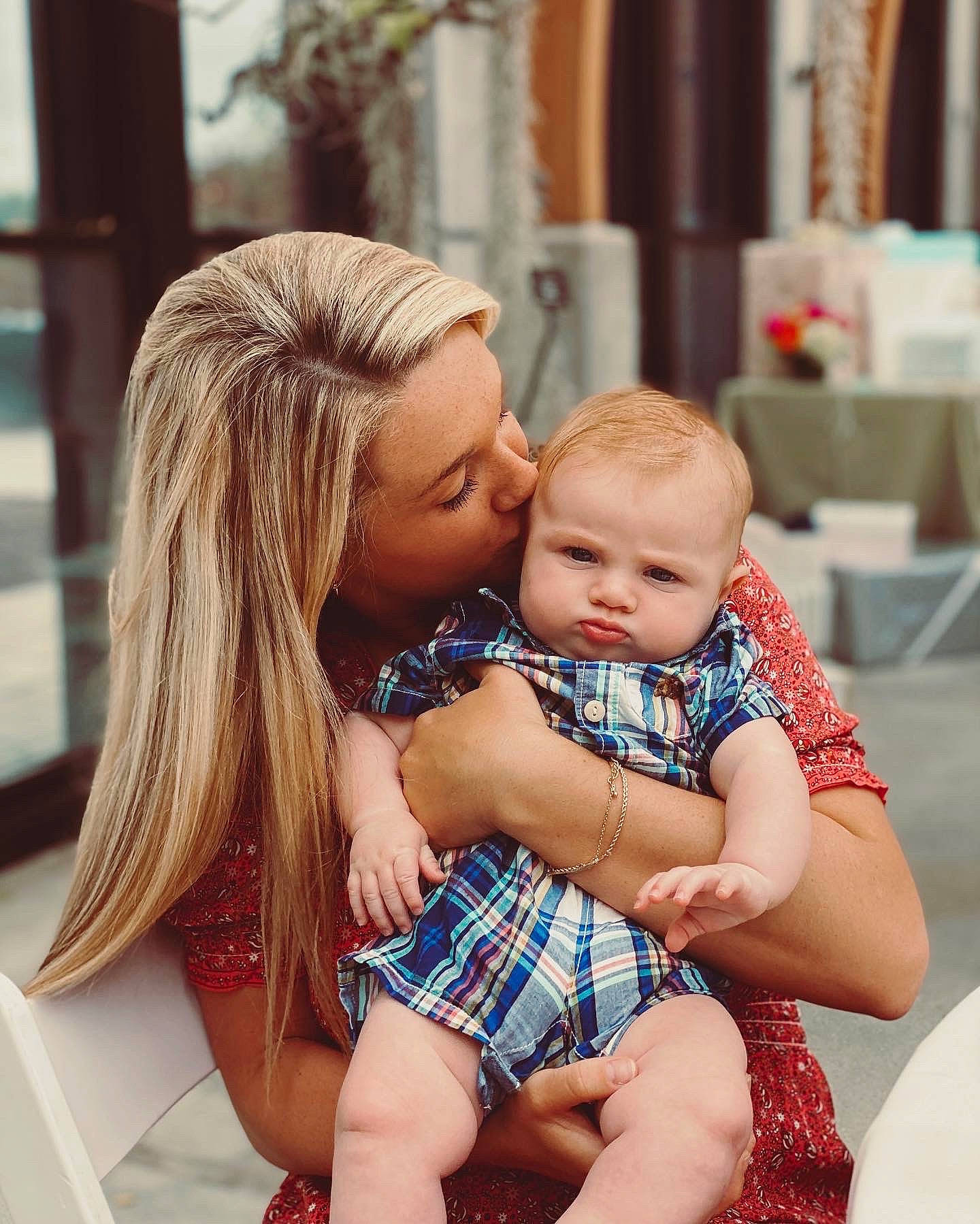 Richie is registered to the contest to win money with this photo: arm, baby, blond, chair, child, event, face, fun, happy, human_leg, jewellery, leisure, people, person, photograph, shoulder, sitting, skin, thigh, toddler