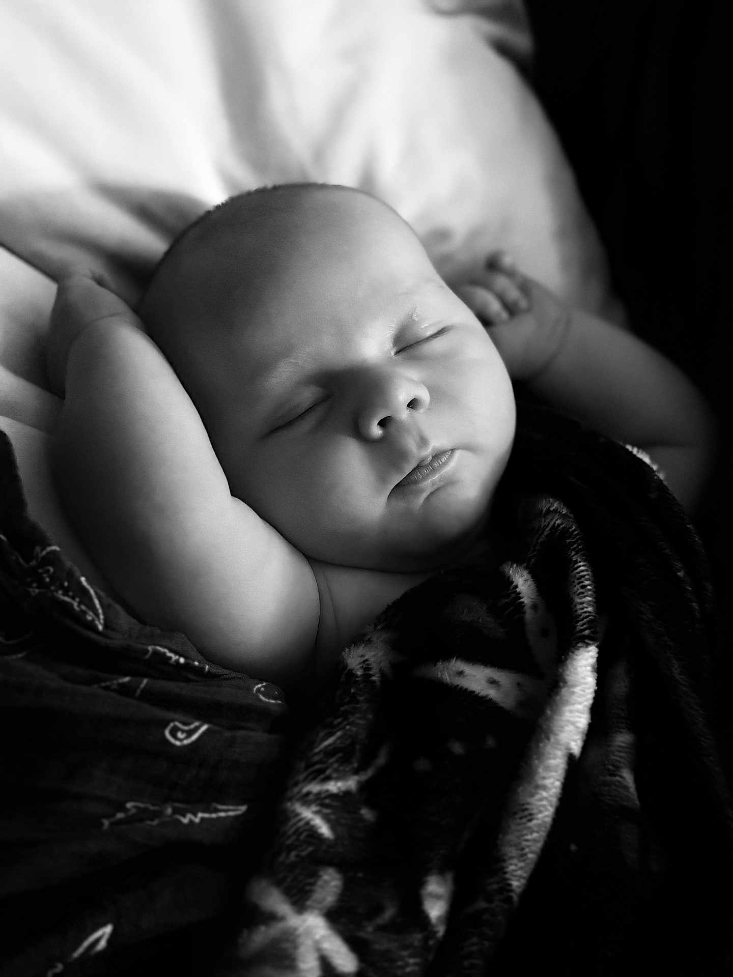 Ivar joined the competition — help win amazing prizes! baby, sleeping, blanket, black_and_white, infant, peaceful, portrait, closeup, soft_light, cozy, resting, child, cute, face, wrapped, indoors, calm, serene, newborn, relaxed