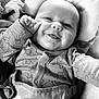 Ivar joined the competition — help win amazing prizes! baby, infant, smile, pajamas, face, cute, child, portrait, black_and_white, hand, clothing, pattern, happy, young, person, sitting, cozy, blanket, soft, closeup