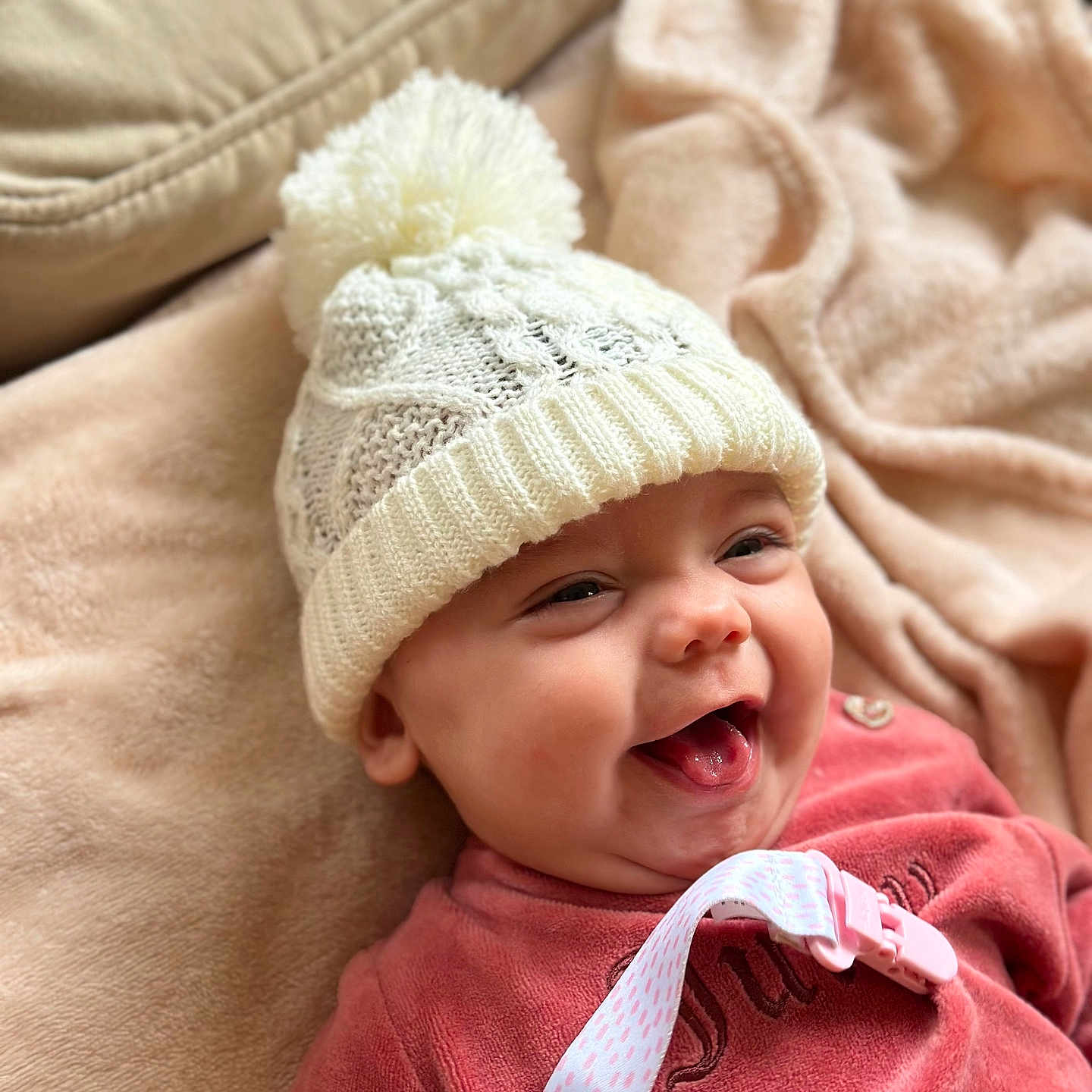 Cypress joined the competition — help win amazing prizes! baby, babylaughing, beanie, bonnet, cap, clothing, coat, couch, face, furniture, happy, hat, head, jacket, laughing, newborn, person, photography, portrait, smile