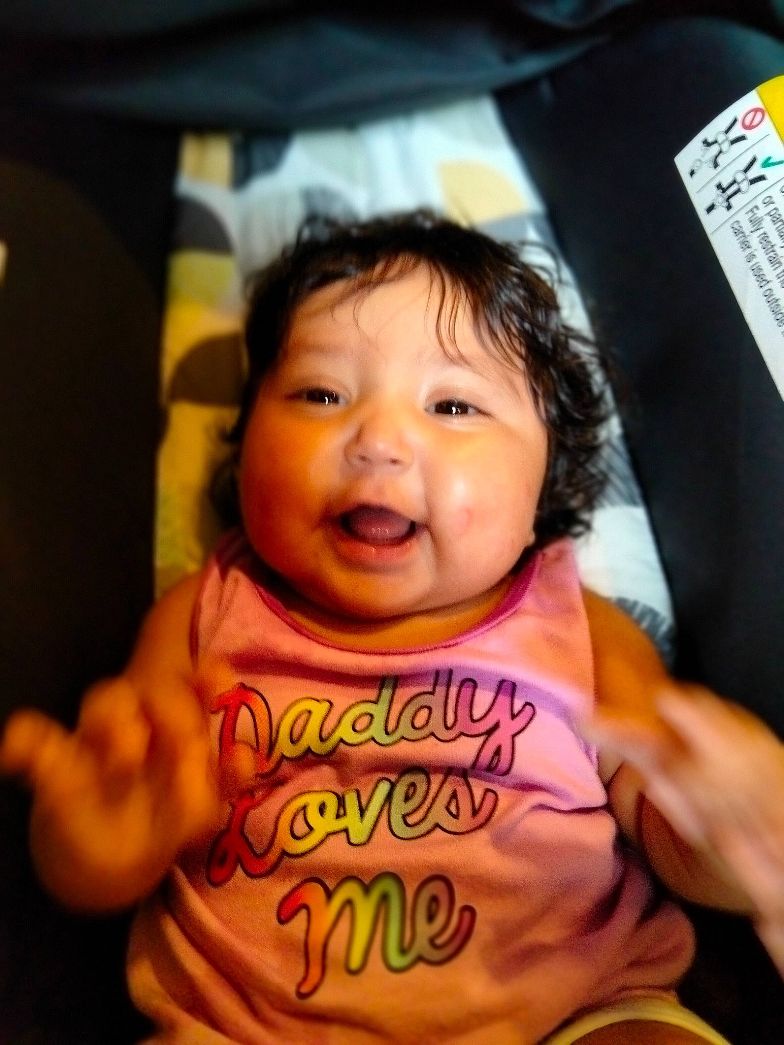 Marisol is registered to the contest to win money with this photo: baby, baby_toddler_clothing, cheek, facial_expression, finger, fun, gesture, happy, human, lip, mouth, nose, organ, person, photograph, pink, product, skin, smile, tableware