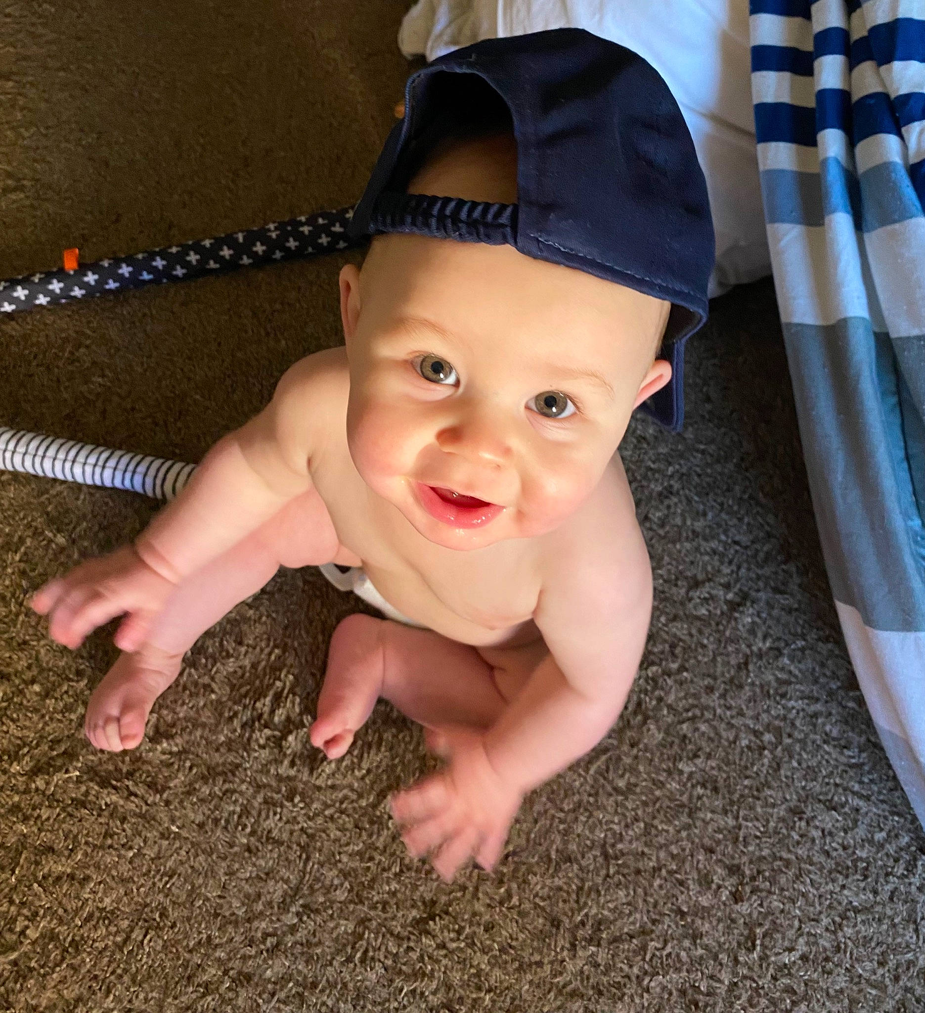 Julian joined the competition — help win amazing prizes! baby, baby_toddler_clothing, cap, costume_hat, eye, face, finger, flooring, foot, happy, hat, head, headwear, human_leg, lip, mouth, nose, person, skin, smile