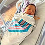 architecture, baby, bed, blanket, building, childbirth, crib, face, furniture, head, hospital, infantbed, newborn, person, sleeping