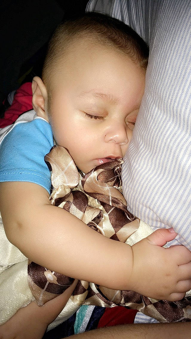 Kelvin Green is registered to the contest to win money with this photo: baby, cheek, child, face, finger, hand, head, mouth, nap, nose, person, skin, sleep, toddler