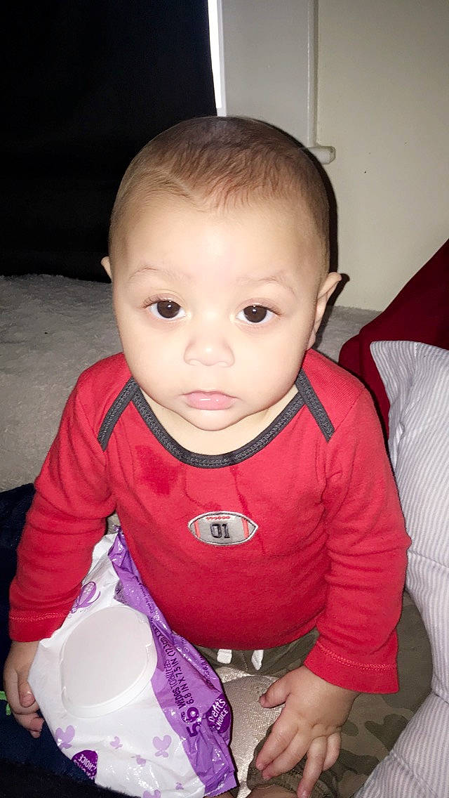 Kelvin Green is registered to the contest to win money with this photo: baby, cheek, child, face, head, lip, mouth, person, sitting, skin, smile, toddler