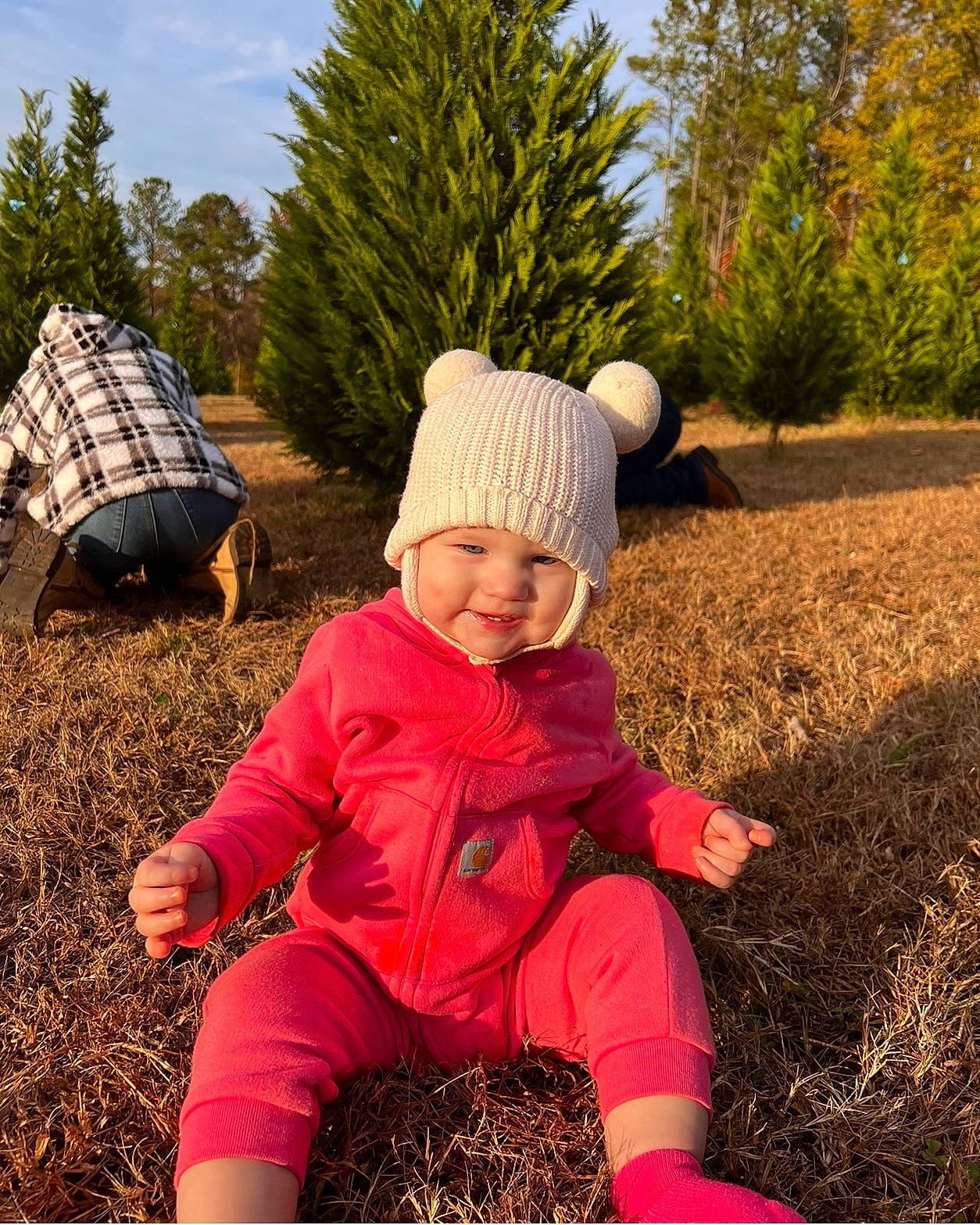 Kassidy is registered to the contest to win money with this photo: boot, botany, cap, child, fun, grass, happy, hat, headwear, human_leg, joy, landscape, leaf, leisure, people_in_nature, person, plant, sitting, sky, tints_and_shades