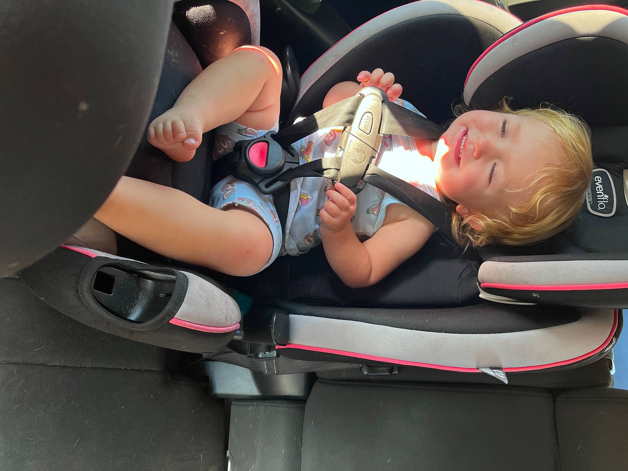Millie joined the competition — help win amazing prizes! auto_part, automotive_design, automotive_exterior, automotive_lighting, automotive_wheel_system, baby, baby_carriage, baby_in_car_seat, bumper, car, car_seat, knee, lap, motor_vehicle, person, thigh, tire, toddler, vehicle, vehicle_door