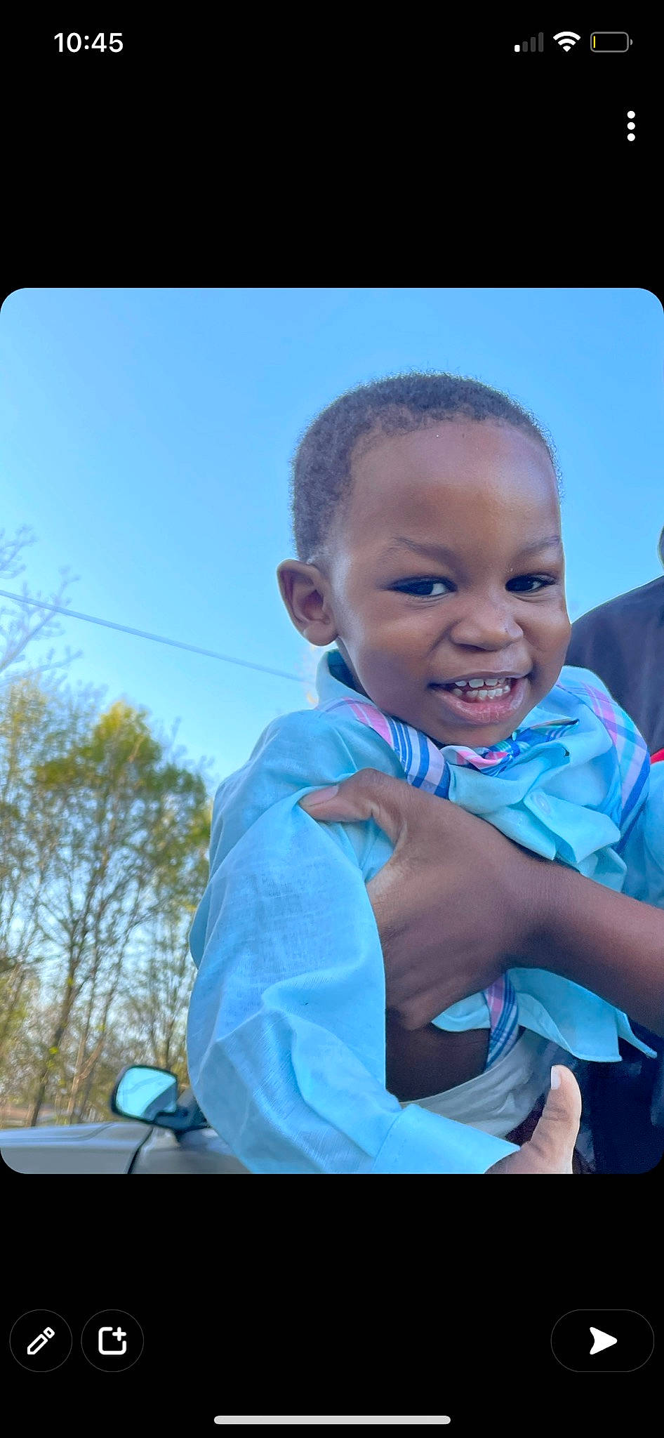 King is registered to the contest to win money with this photo: baby, child, electric_blue, event, flash_photography, fun, gesture, grass, happy, joy, laugh, leisure, person, recreation, sitting, sky, smile, t_shirt, toddler, travel