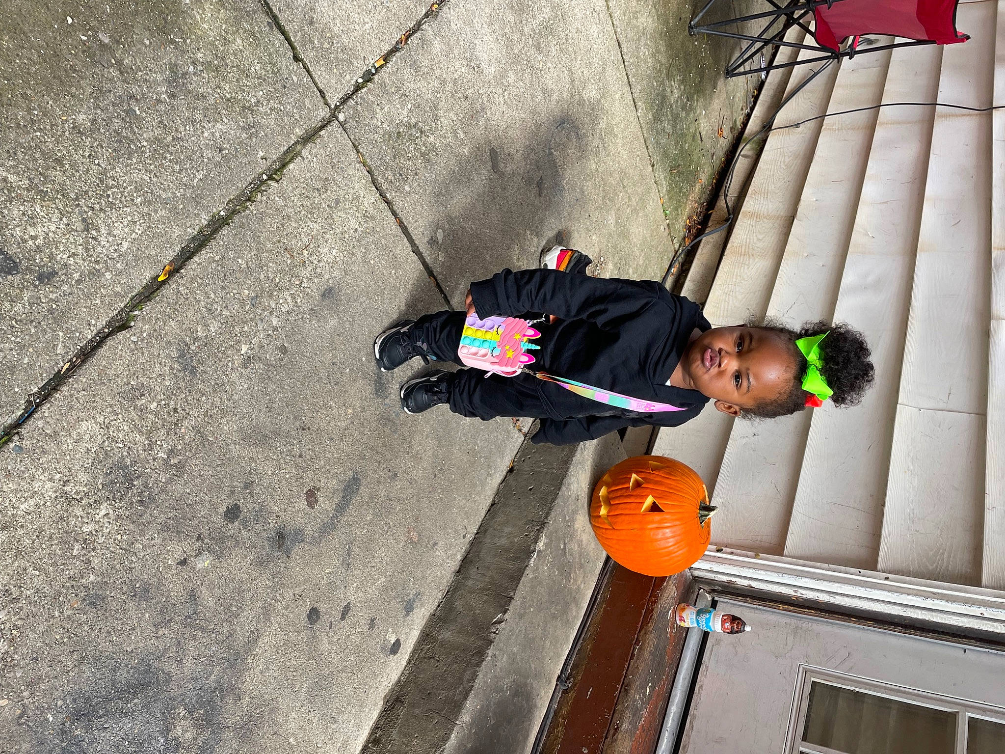 Zariah joined the competition — help win amazing prizes! asphalt, child, cobblestone, concrete, flooring, fun, hat, human_leg, pedestrian, person, road, road_surface, shadow, sidewalk, street, street_fashion