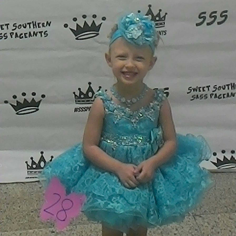 Chasity joined the competition — help win amazing prizes! aqua, ballet_tutu, blue, child, day, fashion_accessory, fun, girl, hair_accessory, headgear, headwear, jewellery, joy, person, play, product, smile, toddler, turquoise