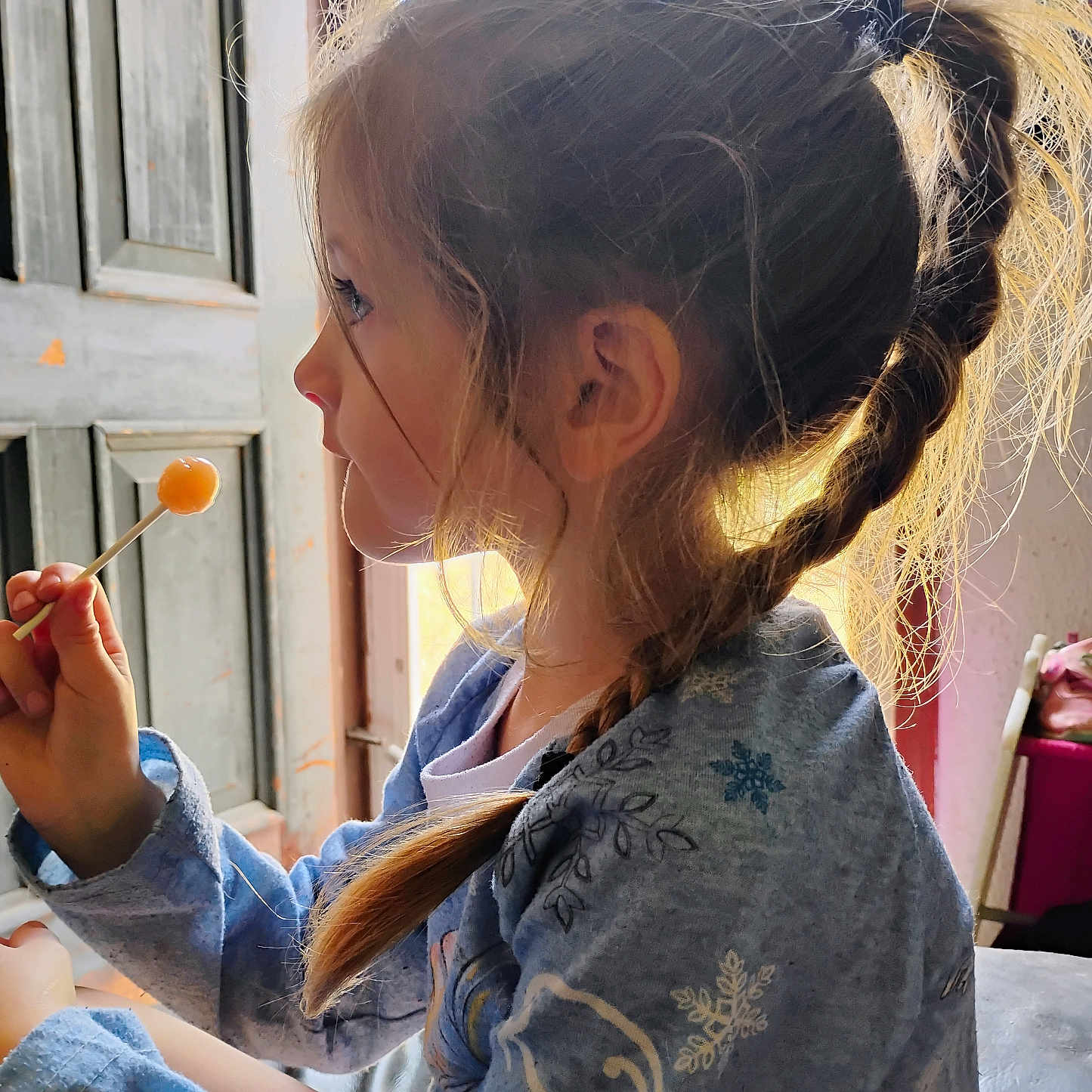 Gabriella joined the competition — help win amazing prizes! bodypart, brush, child, clothing, device, dress, eating, face, female, finger, food, girl, hair, hand, head, person, photography, ponytail, sweets, tool