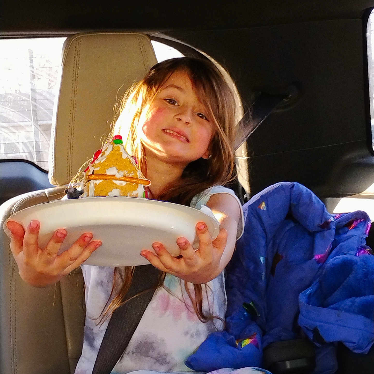 Crystal is registered to the contest to win money with this photo: accessories, belt, bodypart, car, car_interior, carseat, child, cushion, face, female, finger, girl, hand, head, homedecor, person, seatbelt, sitting, transportation, vehicle