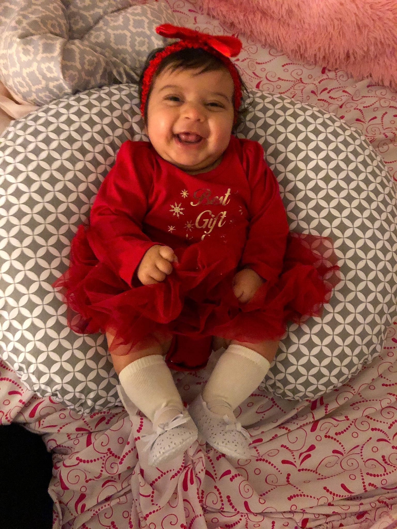 Avery is registered to the contest to win money with this photo: baby, child, knitting, person, red, smile, toddler