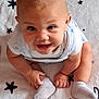 Marquis Junior joined the competition — help win amazing prizes! baby, smiling, happy, infant, sitting, white_socks, blanket, stars, cute, child, portrait, hands, feet, clothing, indoors, face, young, light, skin, person