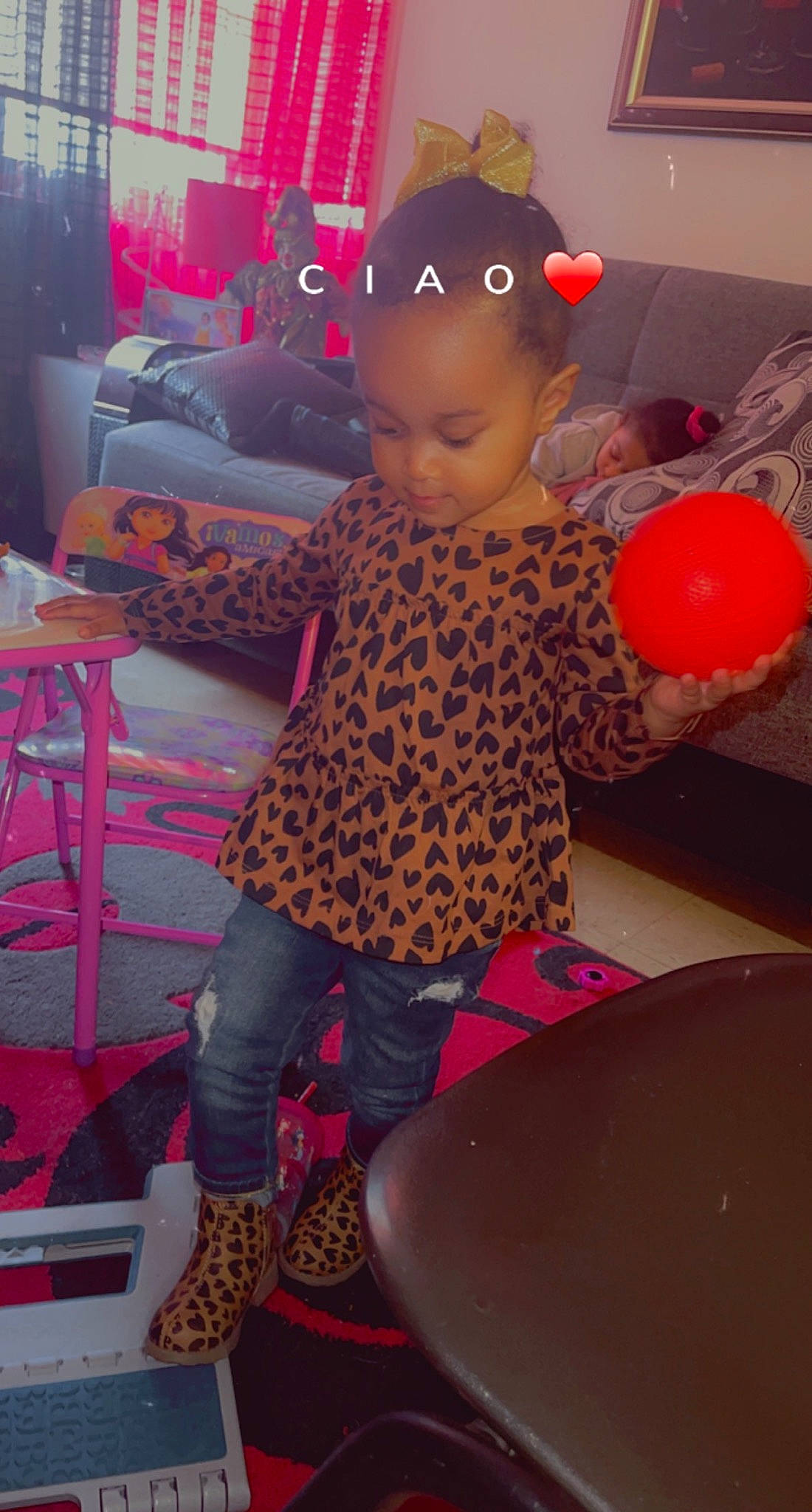 Malaya is registered to the contest to win money with this photo: beauty, child, event, flooring, fun, human_leg, joint, lap, leisure, magenta, pattern, person, photograph, pink, play, red, room, sitting, snapshot, thigh