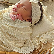Chiara participe au concours pour gagner de l'argent avec cette photo : newborn, baby, sleeping, lace, headband, wicker_basket, blanket, soft_texture, peaceful, infant, wrapped, delicate, indoors, closeup, cute, resting, portrait, cozy, natural_light, baby_clothes