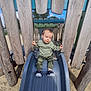 Naël a rejoint le concours — aidez-le/la à gagner de superbes lots ! boy, child, clothing, face, grass, head, male, nature, outdoorplayarea, outdoors, pants, park, person, photography, plant, playarea, portrait, slide, toy, wood