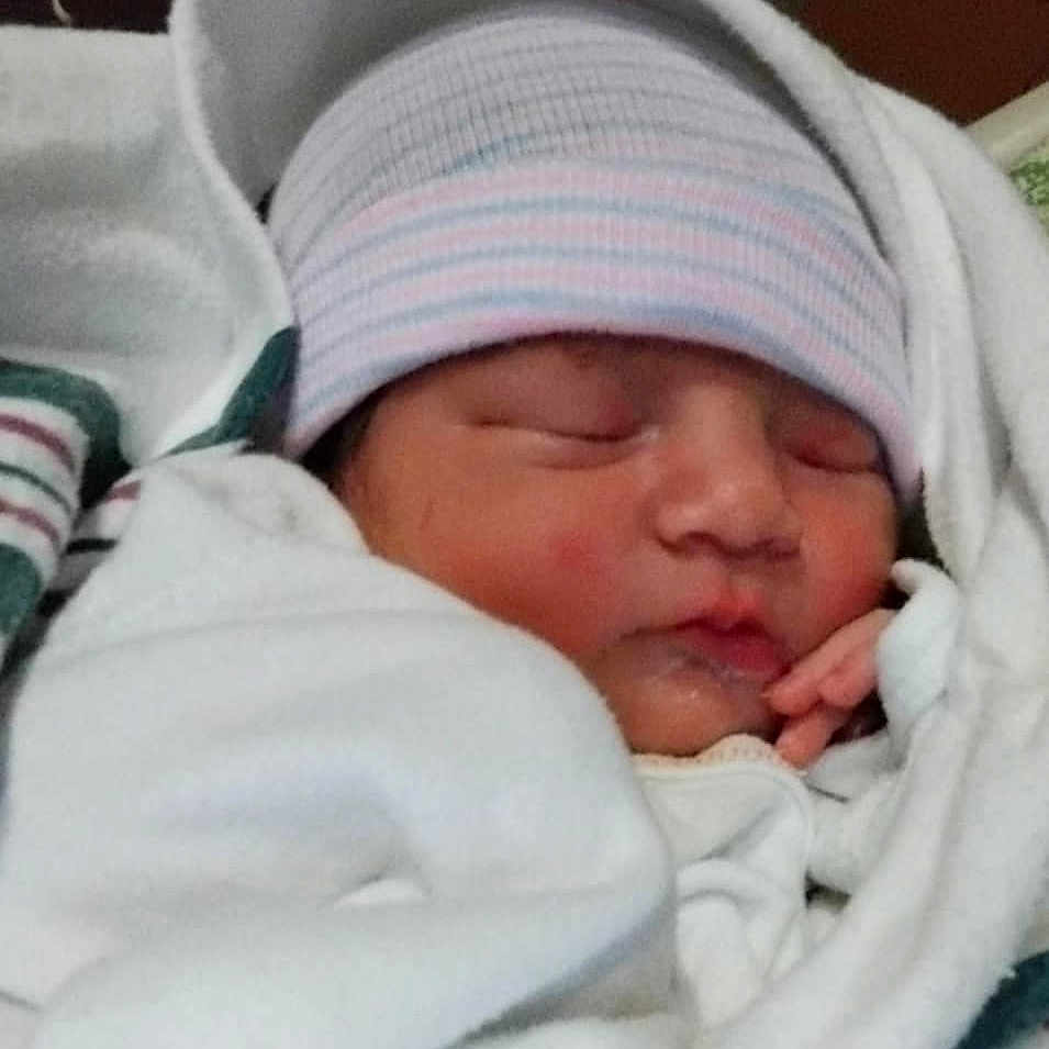 Anavaeh is registered to the contest to win money with this photo: architecture, baby, bed, blanket, building, cap, clothing, face, furniture, glove, hat, head, hospital, newborn, person, photography, portrait, quilt, sleeping, towel