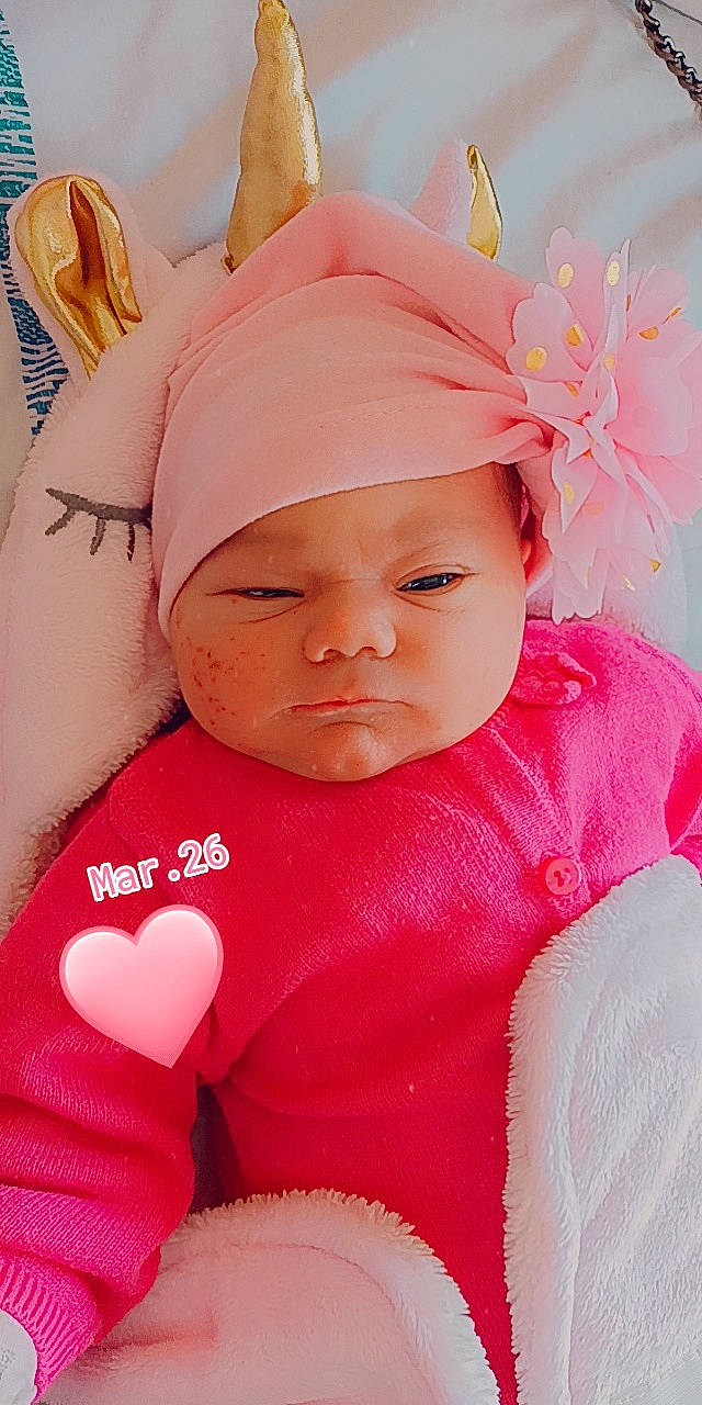 Kenza a rejoint le concours — aidez-le/la à gagner de superbes lots ! baby, baby_products, baby_sleeping, baby_toddler_clothing, cap, cheek, chin, eye, fun, happy, head, headband, headgear, headwear, human_body, lip, magenta, person, petal, pink