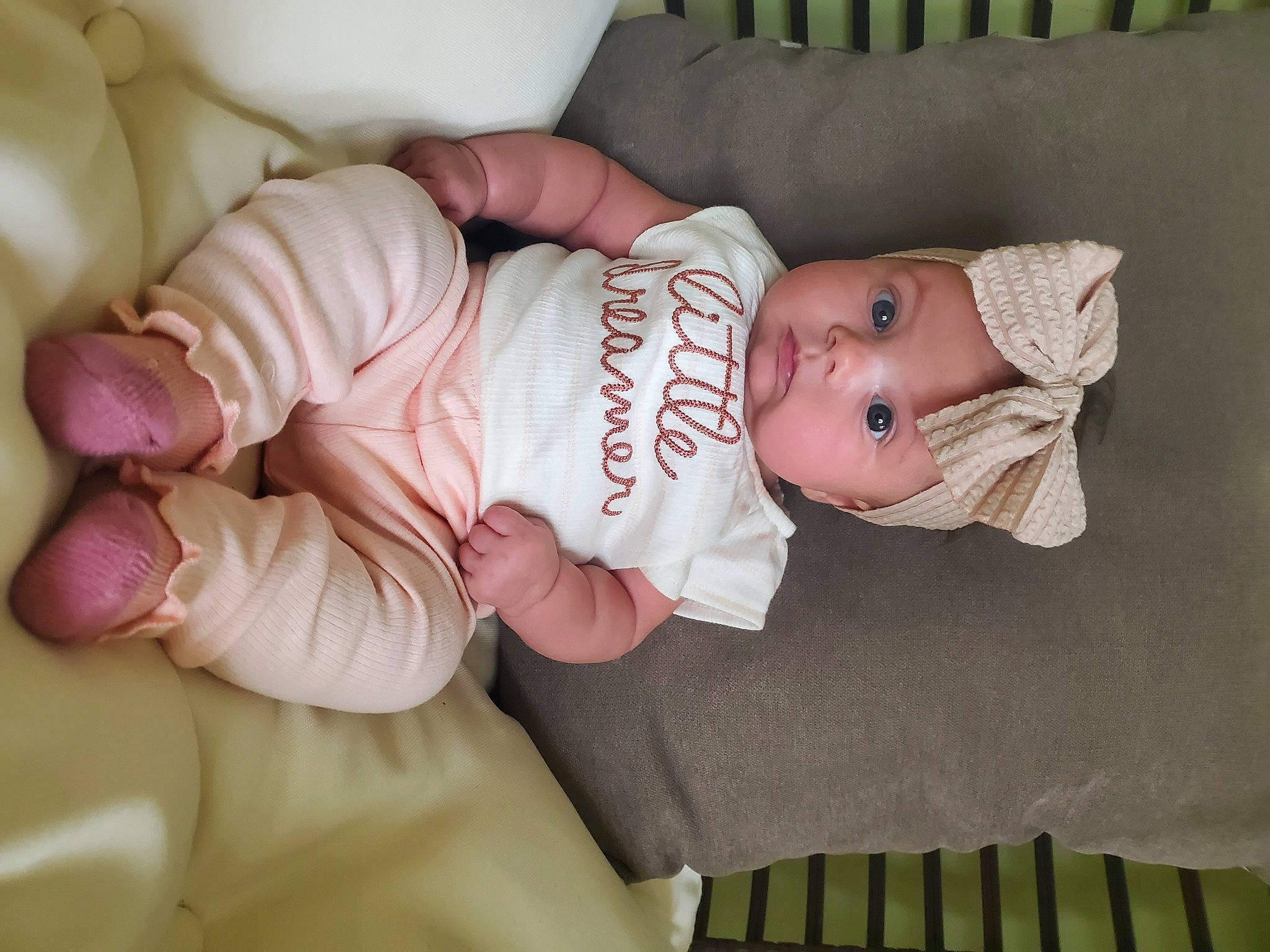 Brynley is registered to the contest to win money with this photo: arm, baby, baby_products, baby_safety, baby_toddler_clothing, cheek, child, clothing, comfort, finger, gesture, hat, headwear, human_body, iris, person, product, skin, sleeve, thumb