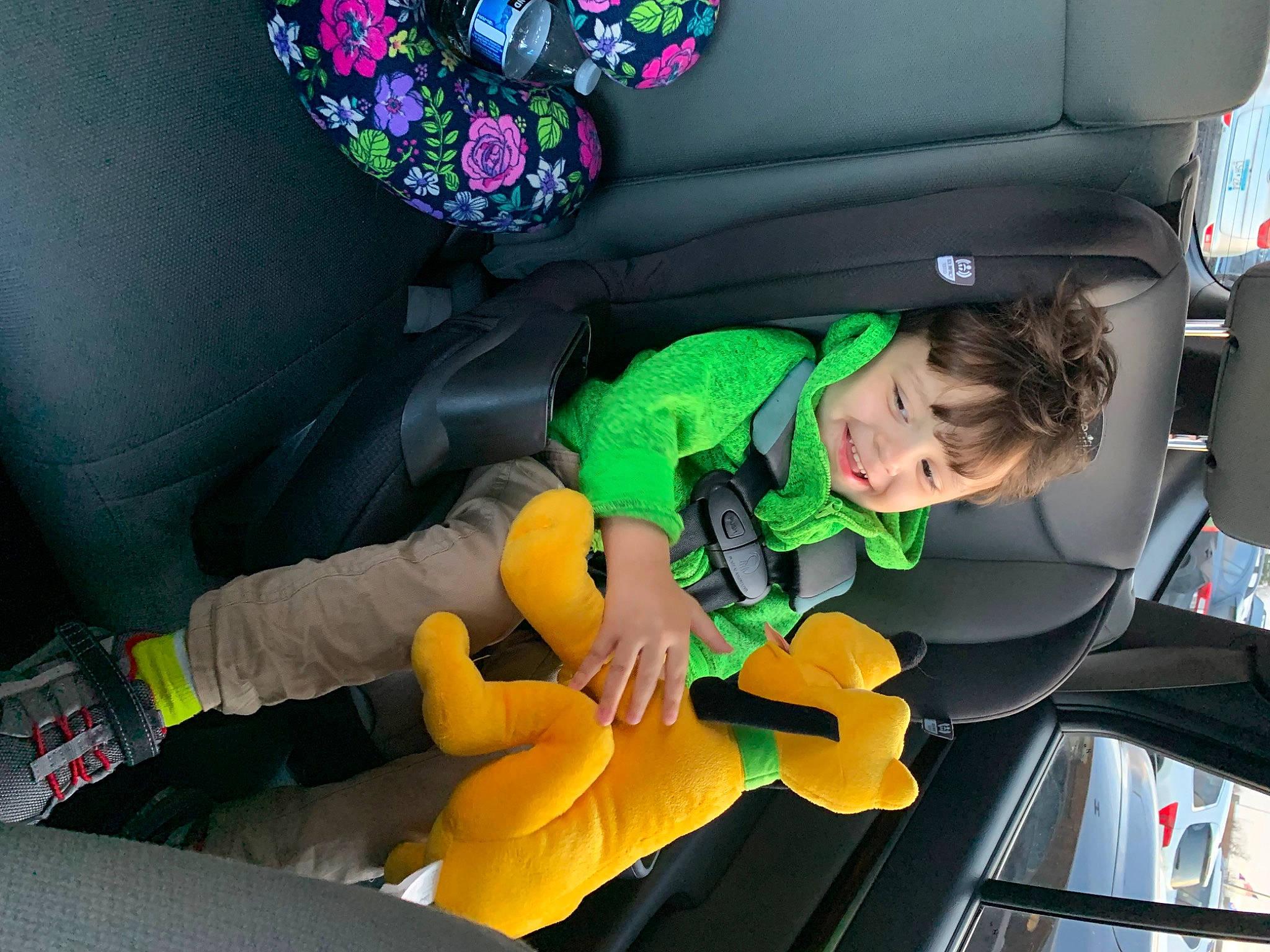 Malakai is registered to the contest to win money with this photo: auto_part, automotive_design, automotive_exterior, car, car_seat, car_seat_cover, child, family_car, fictional_character, fun, joy, luxury_vehicle, motor_vehicle, person, steering_wheel, stuffed_toy, toddler, toy, trunk, vehicle