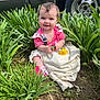 baby, child, smiling, outdoor, plants, flower, grass, greenery, pink_clothing, sitting, nature, tire, car, vintage_car, sunlight, happy, cute, ground, blanket, person