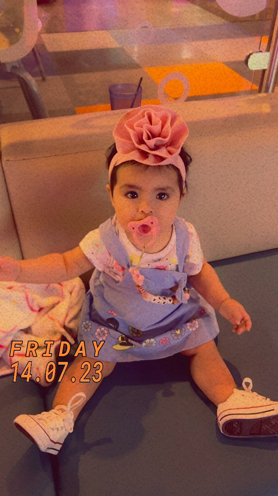 Arya joined the competition — help win amazing prizes! baby, baby_toddler_clothing, child, costume, entertainment, fashion_accessory, flooring, flower, fun, happy, hat, headpiece, leisure, magenta, peach, performing_arts, person, pink, sitting, smile