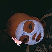 Grayson-Lee joined the competition — help win amazing prizes! child, face_paint, flower_filter, dark_background, hoodie, portrait, face, eyes, playful, young, person, closeup, casual_clothing, indoor, head, expression, digital_filter, skin, cute, resting