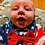 Bodhi joined the competition — help win amazing prizes! accessories, baby, bowtie, clothing, couch, cup, cushion, dress, face, formalwear, furniture, head, homedecor, jewelry, newborn, person, photography, portrait, sitting, tie