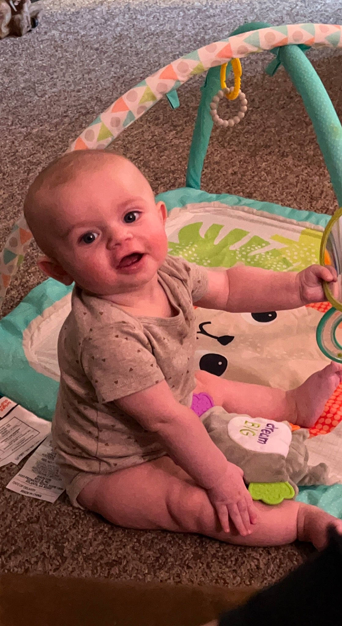 Bryant joined the competition — help win amazing prizes! baby, baby_products, baby_toddler_clothing, cheek, child, facial_expression, finger, fun, grass, happy, head, human_body, leisure, mouth, nose, person, pink, sitting, skin, toddler
