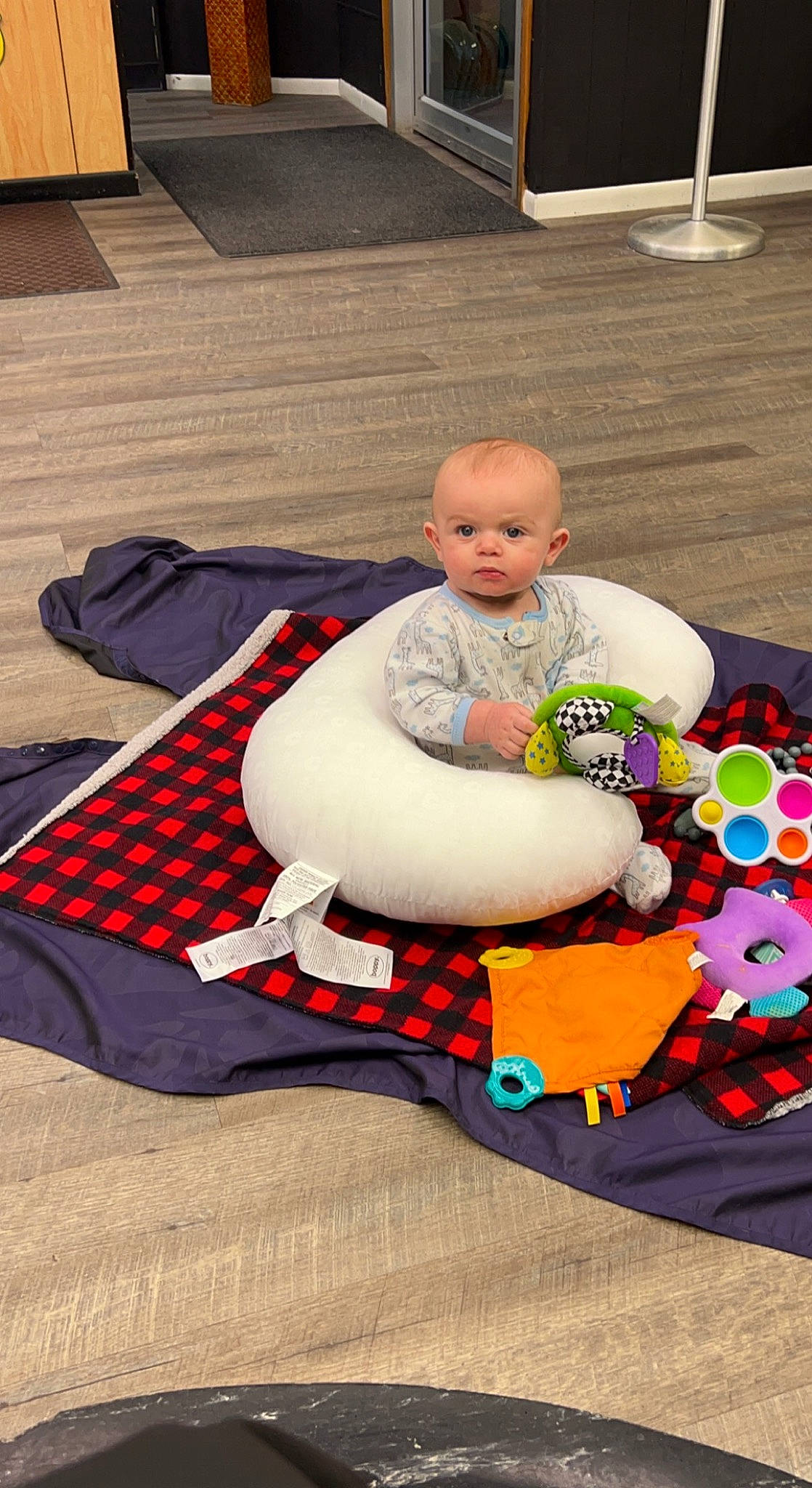Bryant joined the competition — help win amazing prizes! baby, baby_products, baby_toddler_clothing, carmine, carpet, child, comfort, event, flooring, fun, grass, head, human_leg, lap, leisure, linens, pattern, person, sitting, toddler
