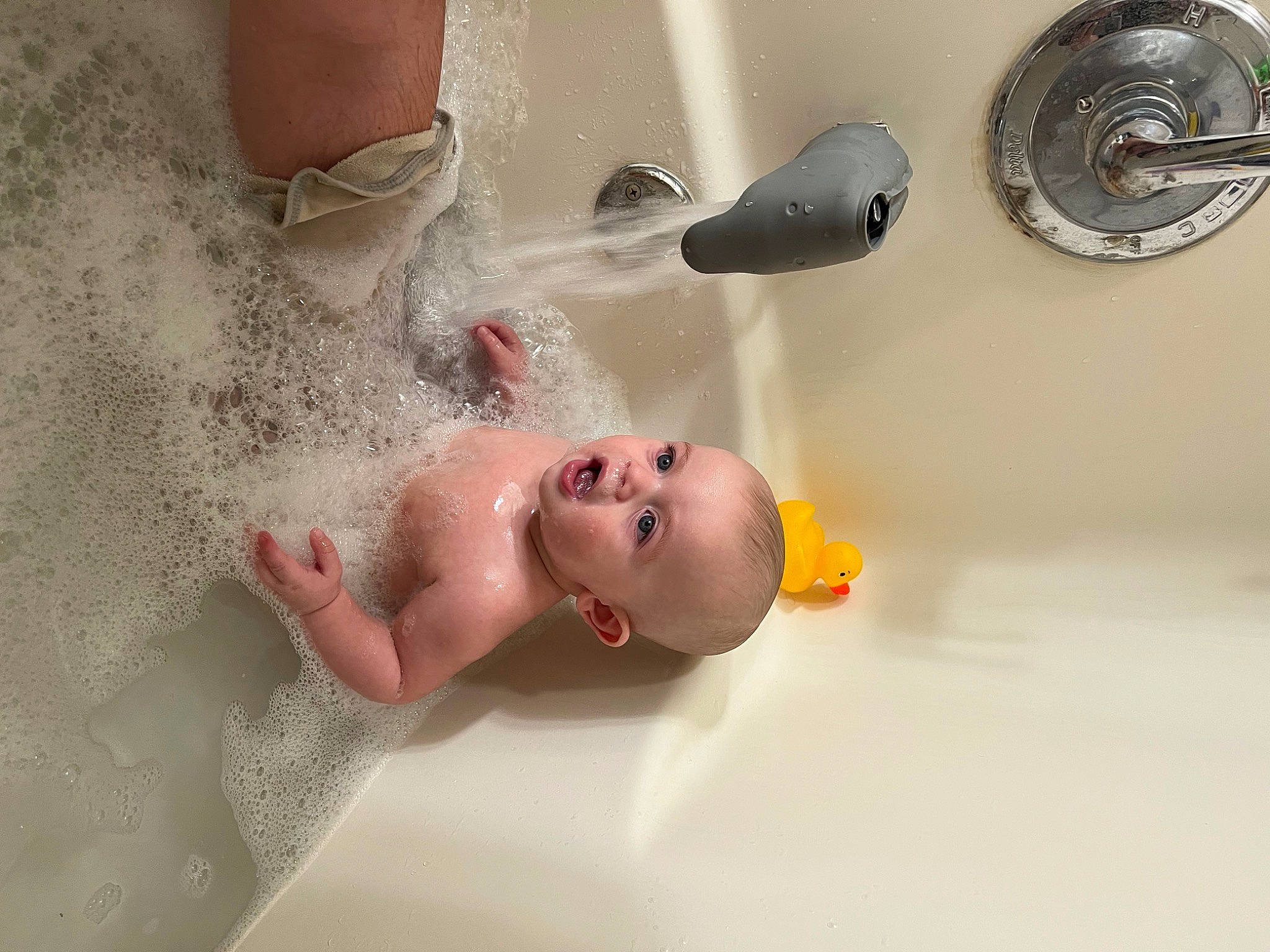 Bryant joined the competition — help win amazing prizes! baby, baby_products, bathing, bathroom, bathtub, chest, child, dead_bolt, door, door_handle, face, flooring, household_hardware, person, plumbing, plumbing_fixture, product, room, surprise, tap
