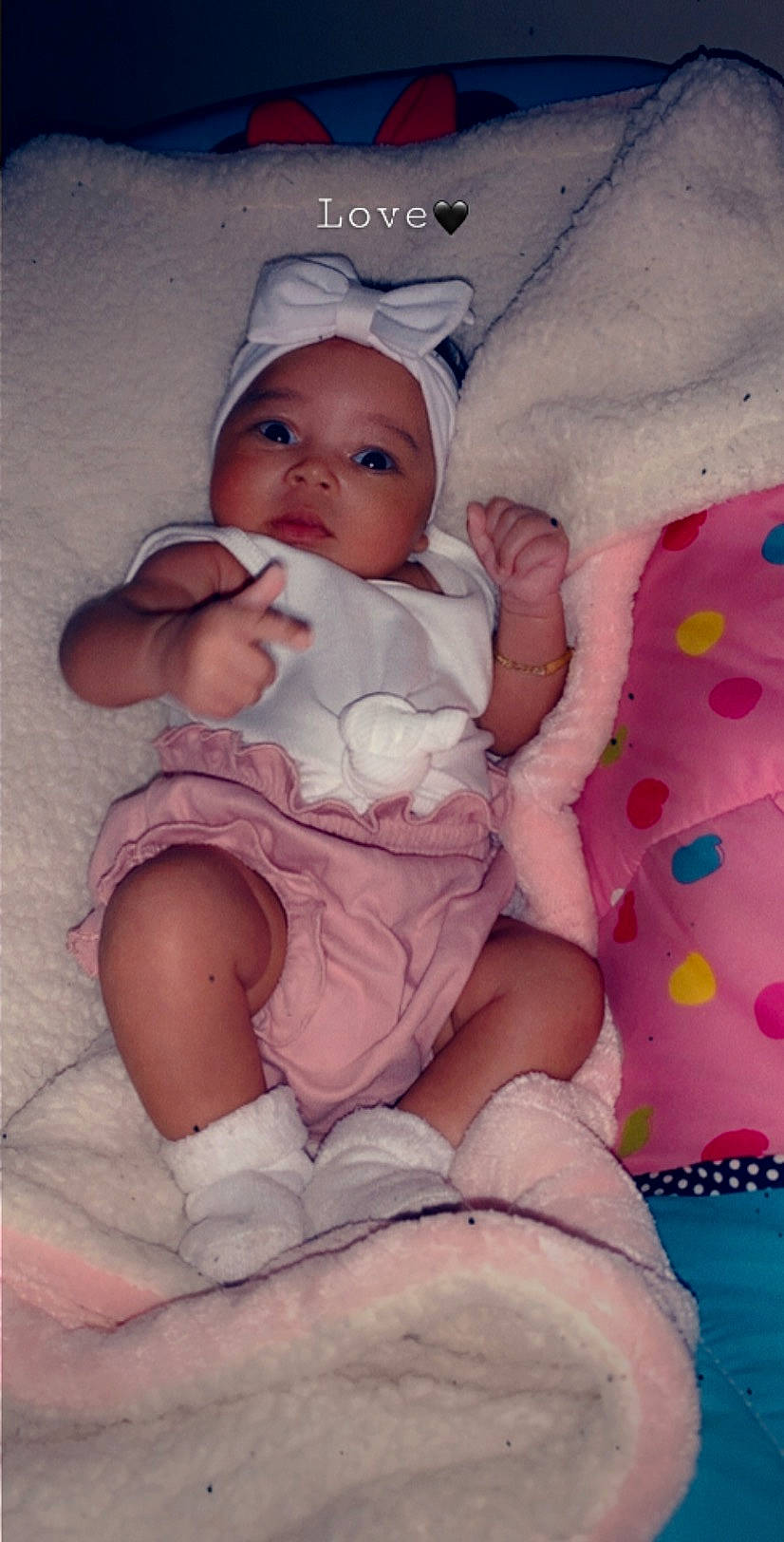 Amia is registered to the contest to win money with this photo: baby, birth, cheek, child, headwear, person, pink, toddler