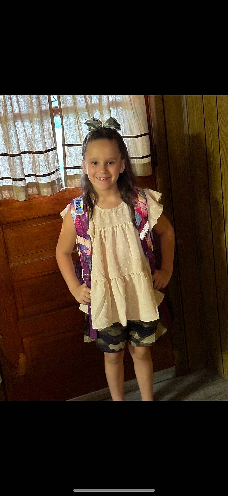 Aleigha is registered to the contest to win money with this photo: face, fashion_design, flash_photography, fun, hairstyle, happy, human_leg, joy, knee, magenta, person, room, skin, sleeve, smile, stairs, standing, textile, thigh, toddler