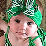 Aleigha joined the competition — help win amazing prizes! baby, headband, bow, green, infant, cute, face, eyes, skin, child, portrait, clothing, indoor, carpet, closeup, person, expression, head, young, adorable