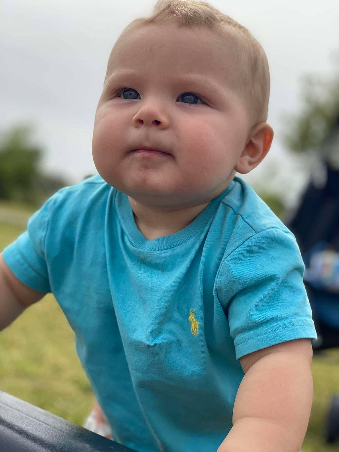 Rowen joined the competition — help win amazing prizes! baby, baby_toddler_clothing, cheek, child, cool, finger, fun, gesture, grass, grassland, happy, leisure, people_in_nature, person, recreation, sitting, sky, sleeve, t_shirt, toddler