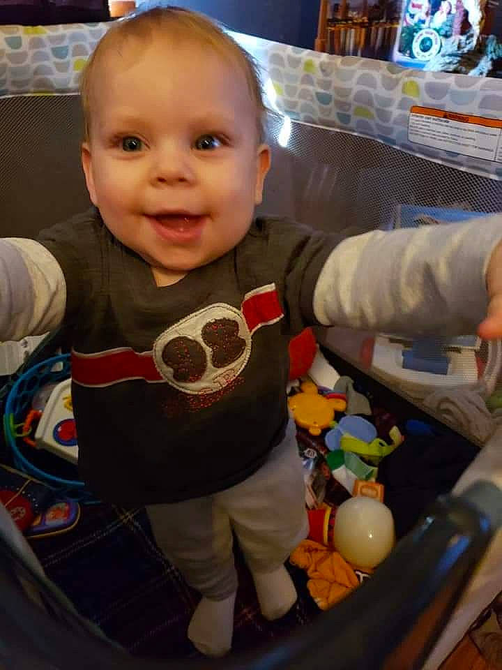 Dustin is registered to the contest to win money with this photo: baby, baby_products, cheek, child, food, joy, person, play, product, sitting, smile, toddler, toy