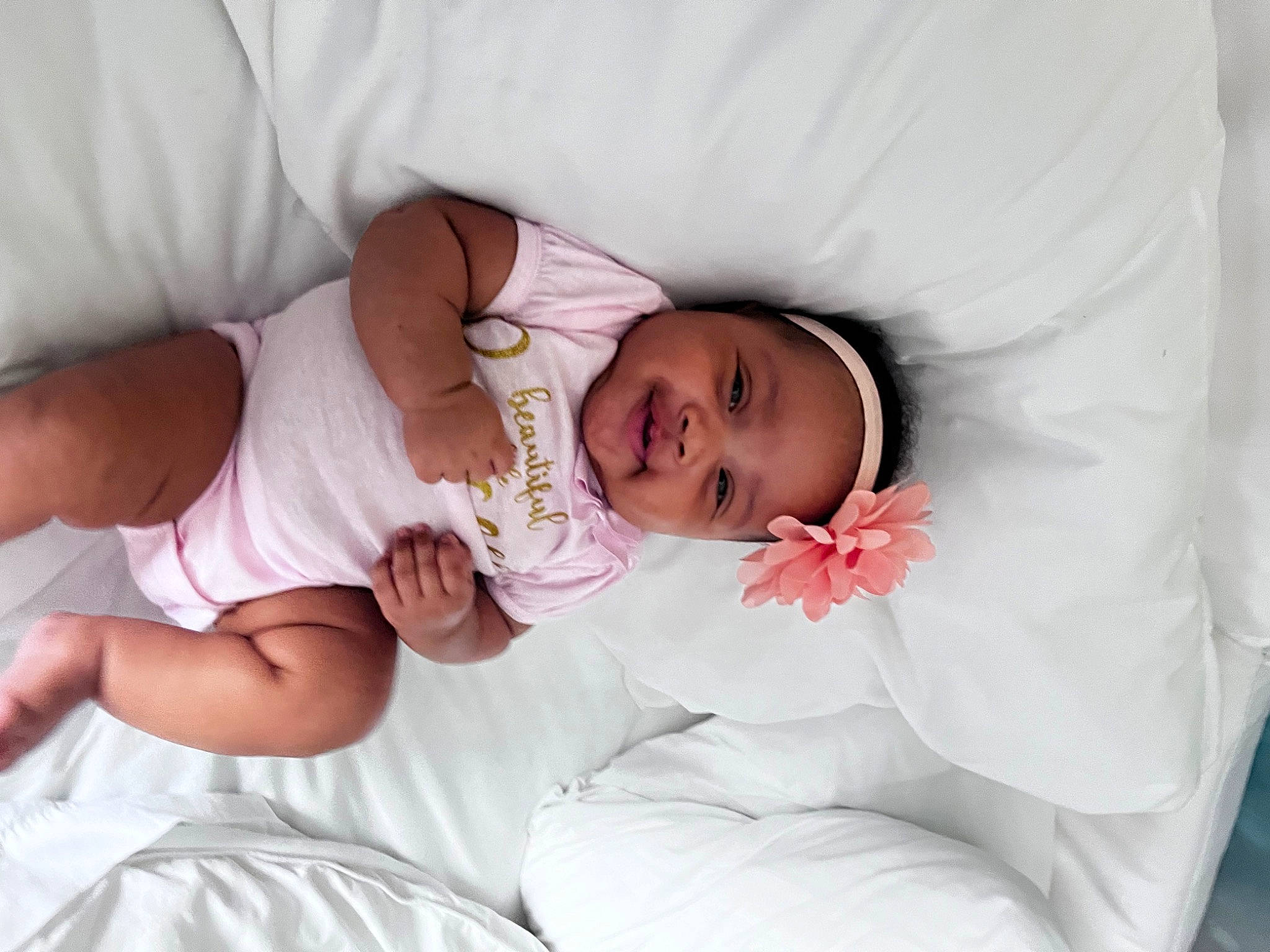 Amora joined the competition — help win amazing prizes! arm, baby, baby_products, baby_toddler_clothing, child, comfort, event, eye, eyelash, facial_expression, finger, hand, happy, hat, headwear, human_body, pattern, person, room, skin