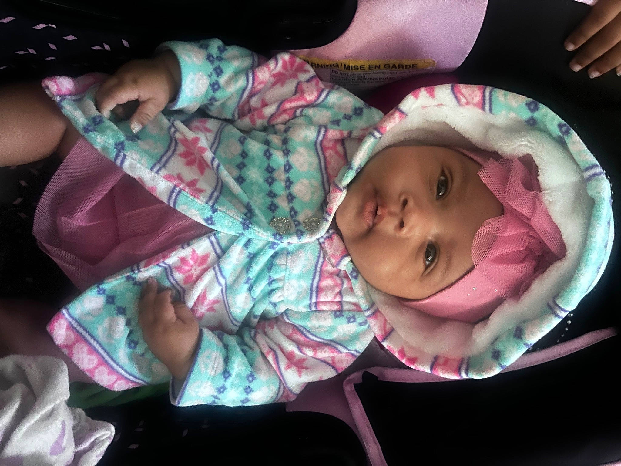 Amora joined the competition — help win amazing prizes! baby, baby_carriage, baby_products, baby_toddler_clothing, cheek, child, comfort, finger, fun, happy, head, headwear, mouth, pattern, person, pink, sitting, skin, smile, thumb