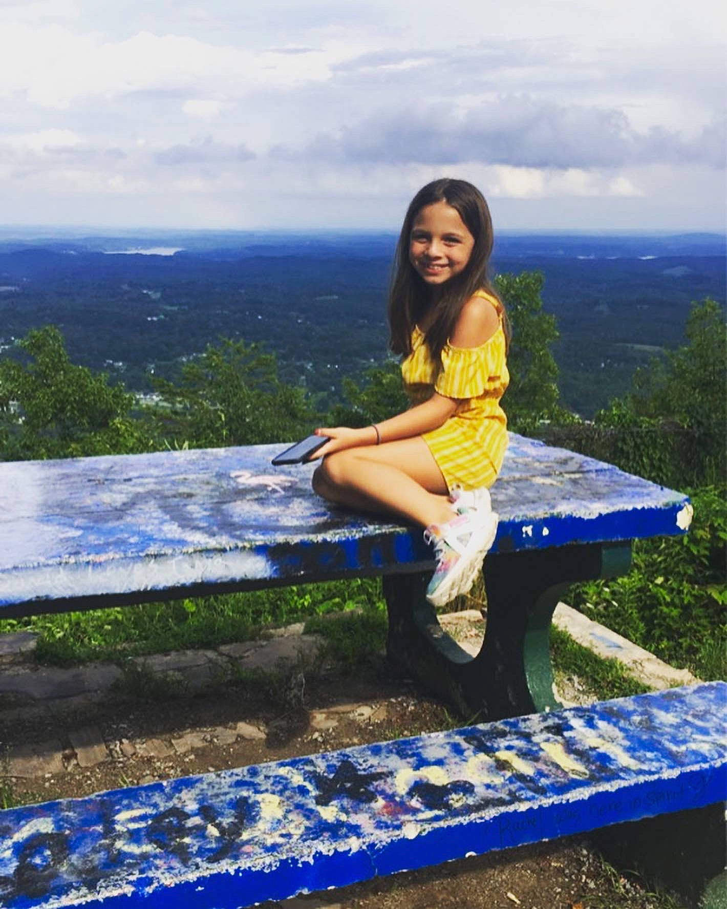 Prisha joined the competition — help win amazing prizes! azure, black_hair, blue, cloud, flash_photography, fun, grass, happy, joy, knee, landscape, leisure, morning, people_in_nature, person, plant, sky, smile, standing, thigh