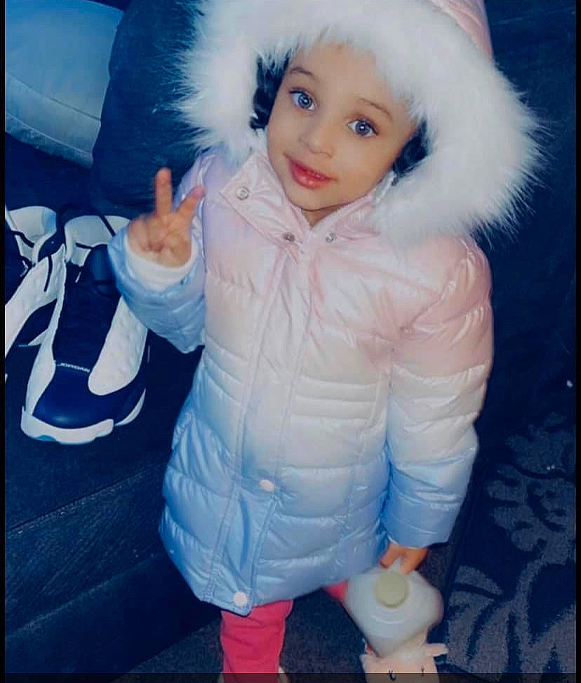 Asyia is registered to the contest to win money with this photo: baby_toddler_clothing, child, costume, electric_blue, eye, fictional_character, fun, fur, fur_clothing, gesture, glove, happy, jacket, person, personal_protective_equipment, sleeve, thumb, toddler, tree, white