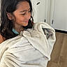 Blair joined the competition — help win amazing prizes! child, girl, kitten, cat, blanket, smiling, portrait, indoors, home, wooden_floor, white_blanket, holding, cuddling, pet, animal, long_hair, profile, cozy, cute, photography