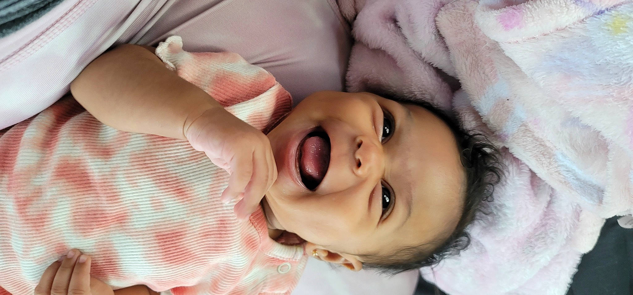 Makaylah is registered to the contest to win money with this photo: cheek, comfort, eye, eyebrow, eyelash, forehead, gesture, happy, human_body, iris, lip, mouth, neck, nose, person, pink, skin, sleeve, smile, toddler