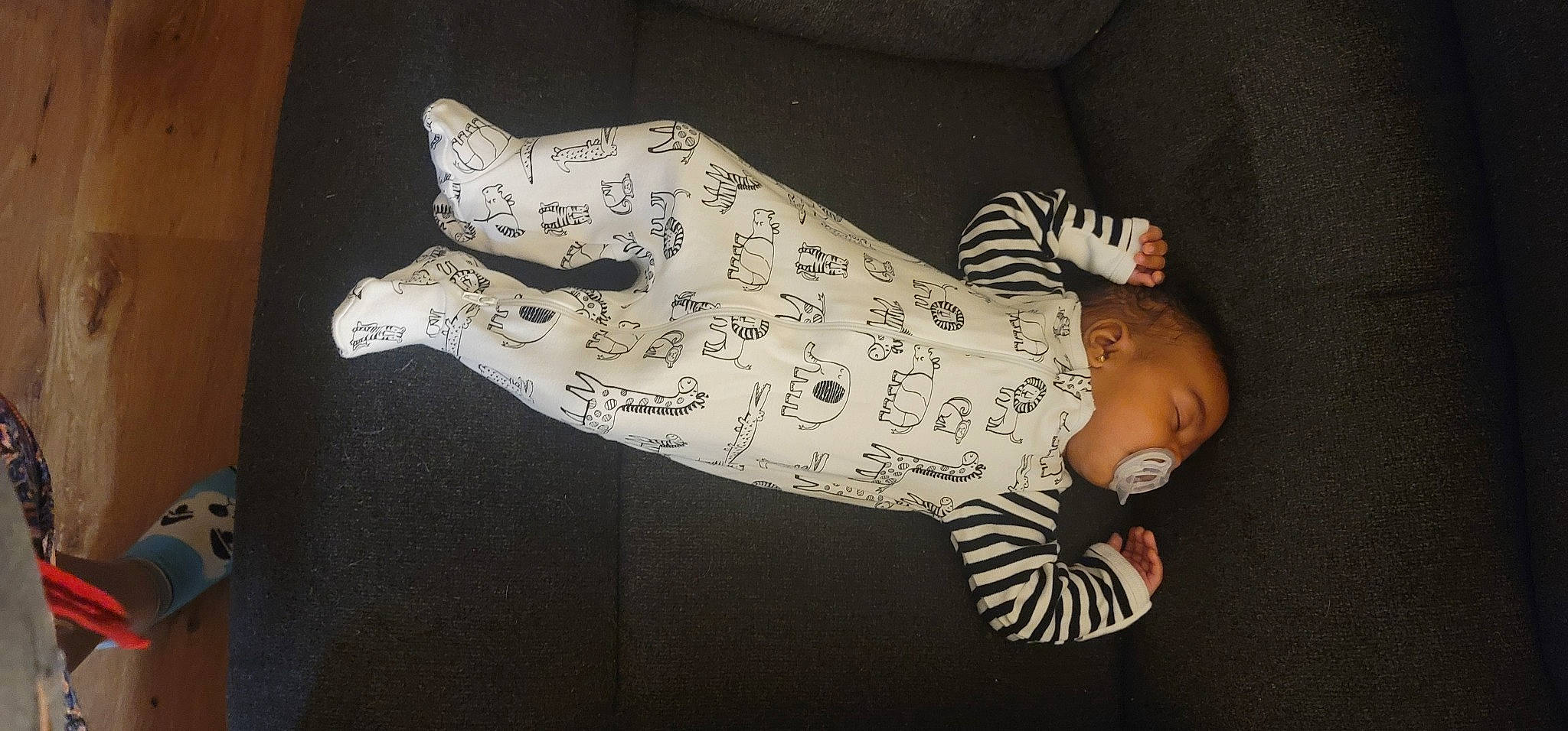 Makaylah is registered to the contest to win money with this photo: art, baby, baby_products, baby_toddler_clothing, fawn, felidae, flooring, foot, hand, head, human_body, human_leg, pattern, person, sitting, sleeve, small_to_medium_sized_cats, tail, toddler, vertebrate